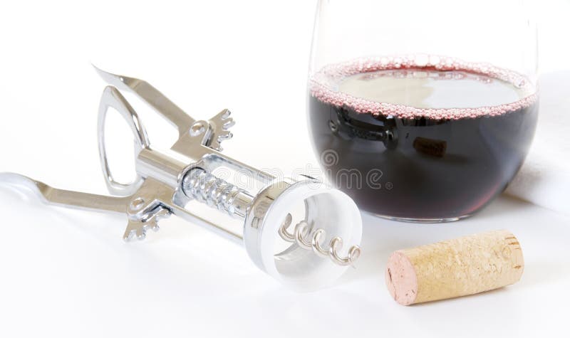 Glass of Red Wine with Cork and Wine Opener