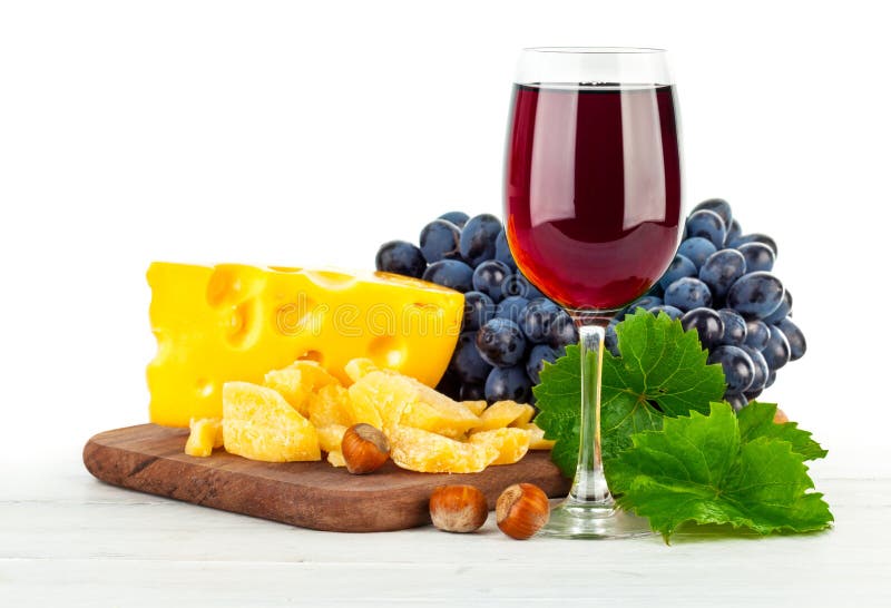 Glass red wine with grapes and cheese