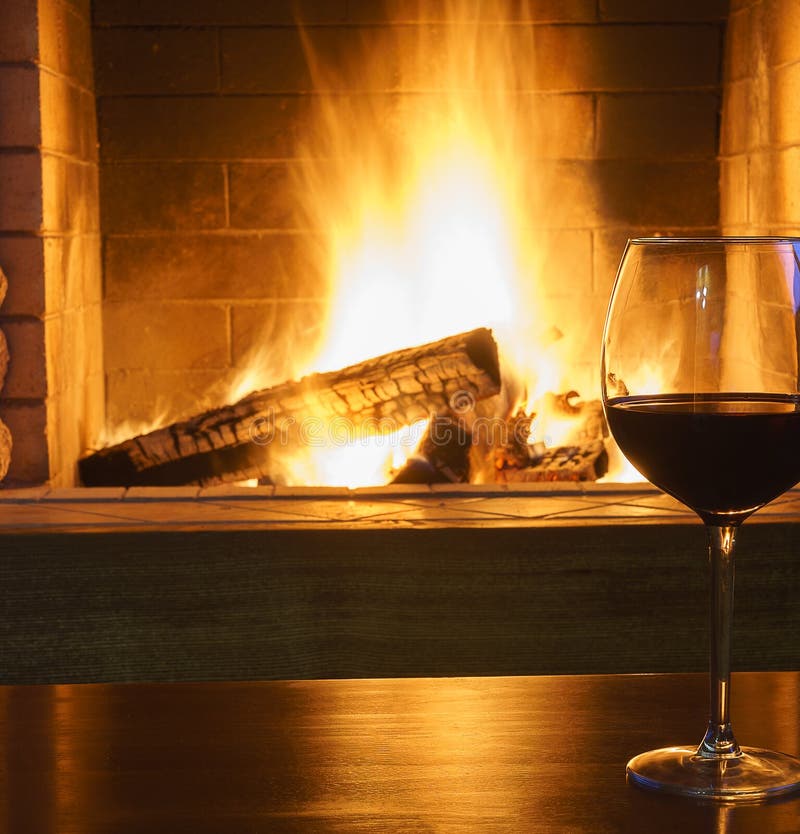 Glass of Red Wine Near Cozy Fireplace. Stock Image - Image of retro ...