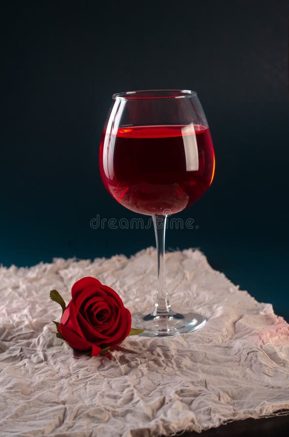 A Glass of Rose Wine with a Rose Stock Photo Image of alcohol, clean