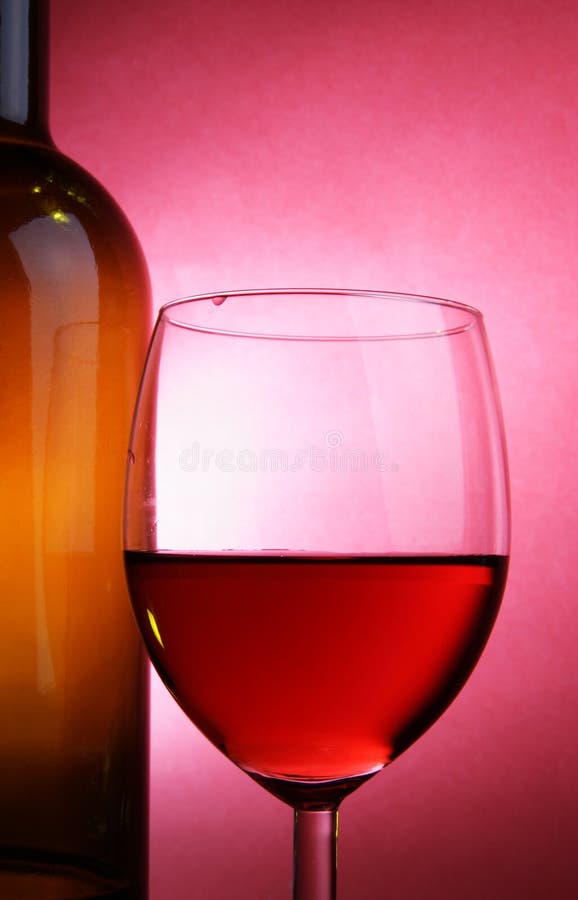 Glass of Rose Wine with Bottle and Ripe Grapes Isolated Stock Image