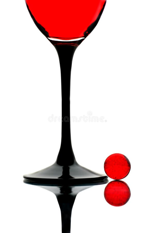 Glass of Rose Wine and Red Bal stock photo Glass of Rose Wine and Red Bal stock photo
