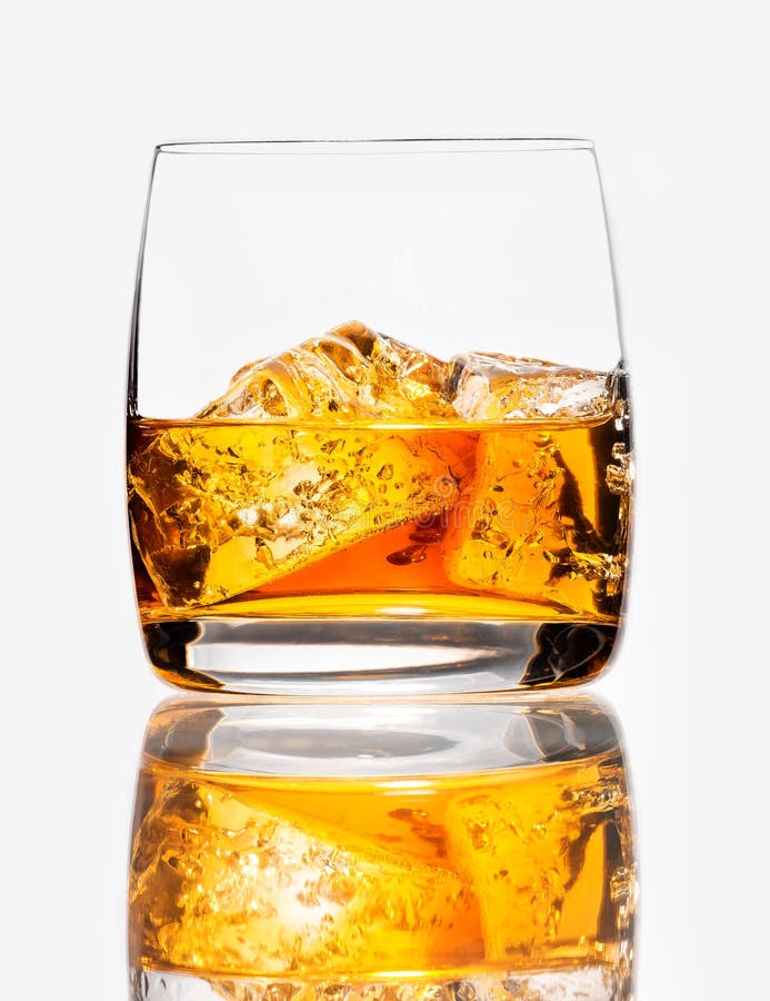 Glass of Scotch Whiskey and Ice on a White Background, Isolated Stock