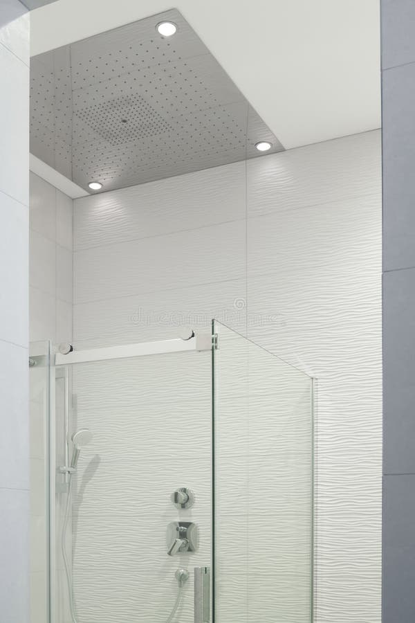 Glass Shower Corner with Shower Head on One Wall and Hidden Mode