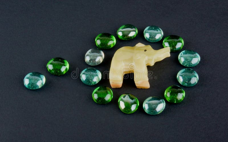 Glass stones and onyx elephant