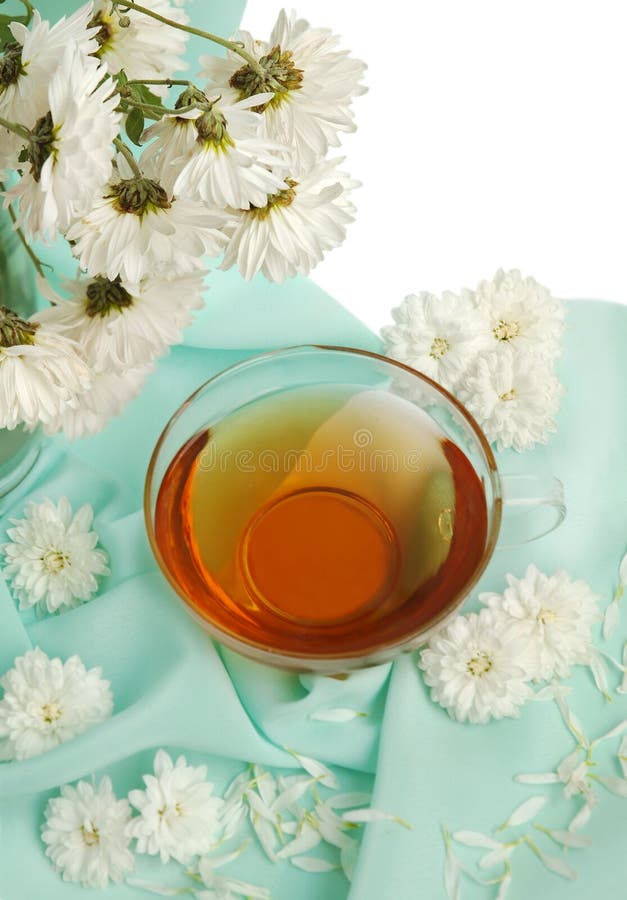 Glass tea cup and flowers stock image. Image of healthcare 7119489