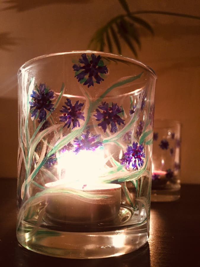 Glass tea light holder painted with corn flowers stock photos Glass tea light holder painted with corn flowers stock photos