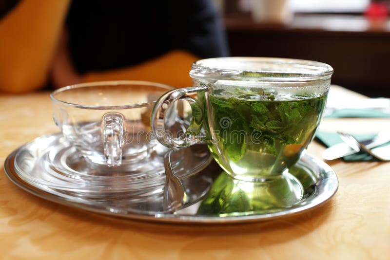 Glass teapot with mint tea stock image. Image of restaurant 41907315