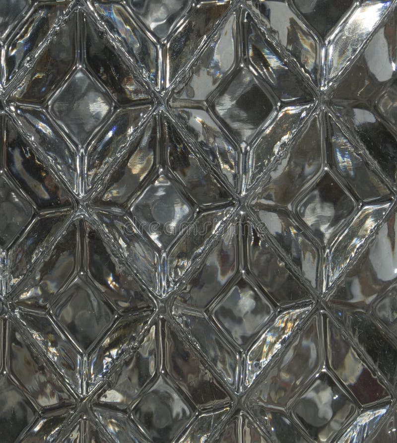 Glass Texture with a Pattern of Rhombuses. Clear Glass Diamond Shape
