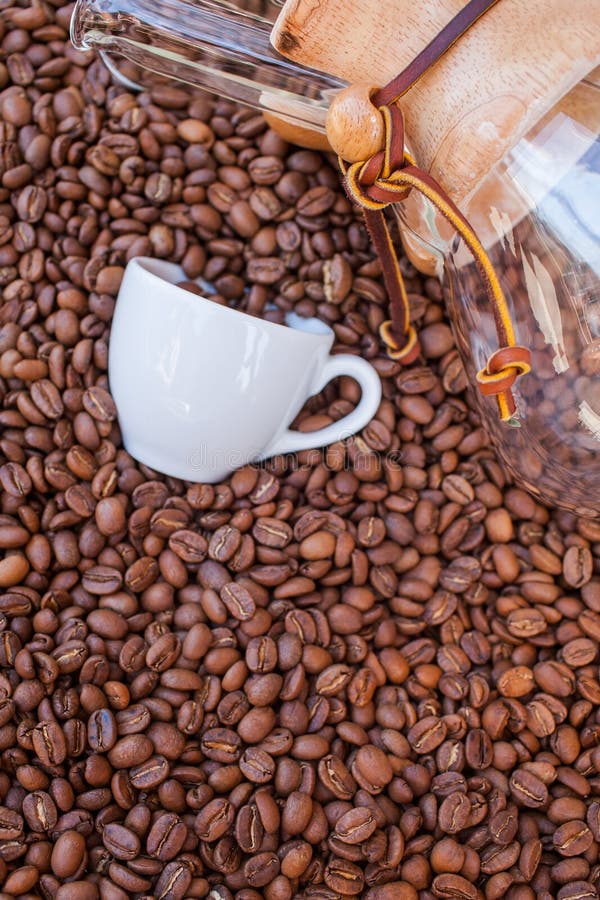 Glass Vessel Coffee Mug Pile Coffee Beans Background Stock Photos