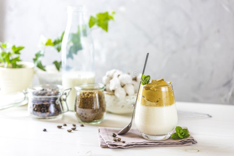 Glass with Water Drops of Coffee Trend Dalgona Coffee, Whipped Instant Coffee and Ingredients