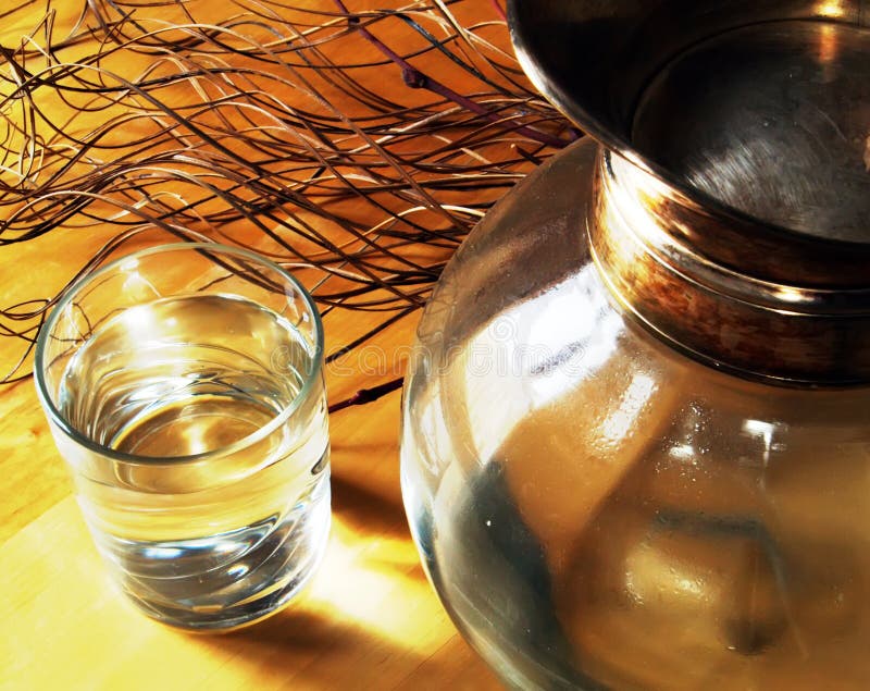 Glass of water and jug