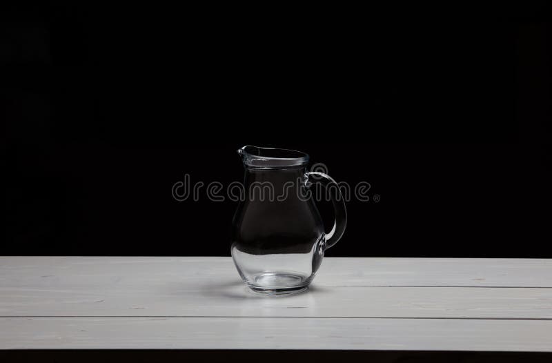 Glass water jug on table stock image. Image of clean 276707793