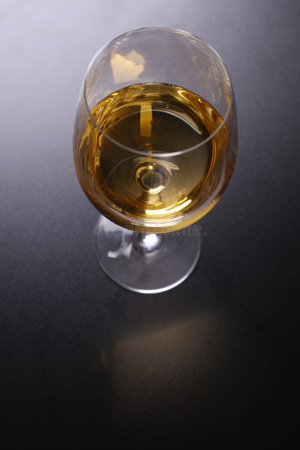 Glass of white wine stock image. Image of texture, luxury 51913767