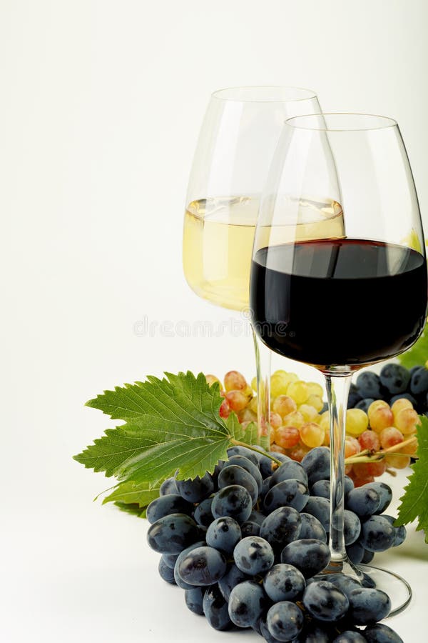 A Glass of White Wine, a Glass of Red Wine, Fresh Grapes and Grape