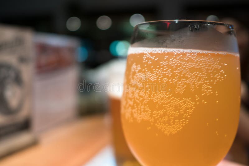 Glass Of Yellow Chilled Craft Beer With Bubbles Stock Photo Image of