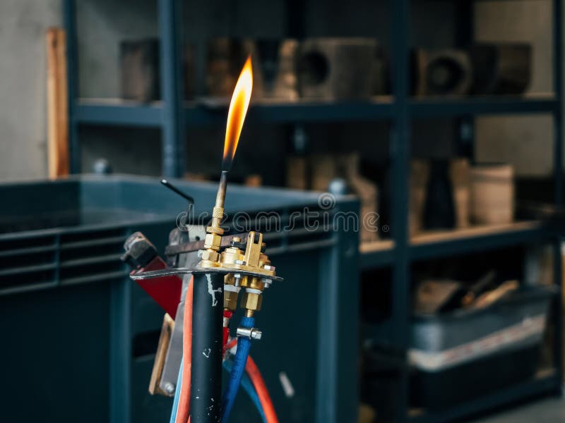 Glassblowing Work Place and Torch Pilot Flame stock image