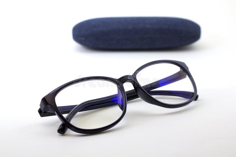 Glasses with blue jeans stock image. Image of optical 93700539