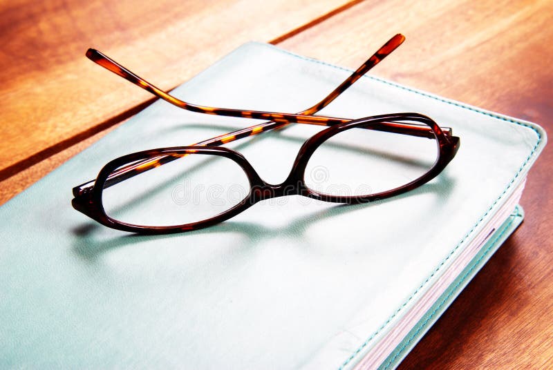 Glasses on a book