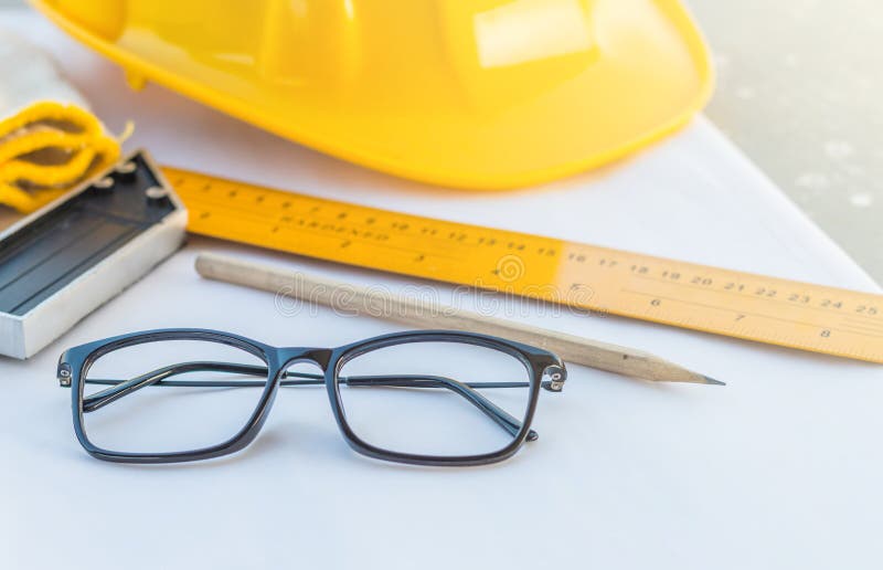 The Glasses and the Construction Equipment at Construction Site Stock