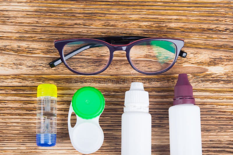 Glasses, containers for cleaning contact lenses, to improve vision