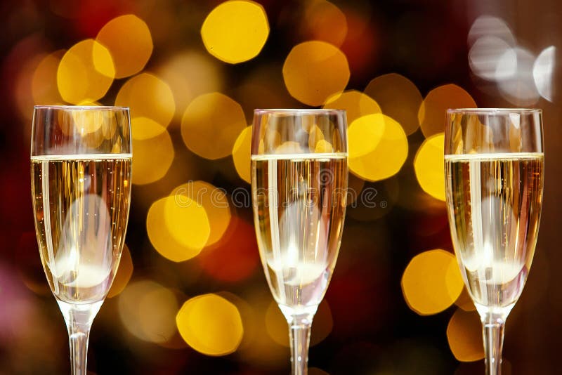 Three glasses with a cool delicious champagne or white wine at the event catering. Three glasses with a cool delicious champagne or white wine at the event catering