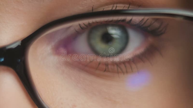 Glasses eyewear closeup of woman holding eye