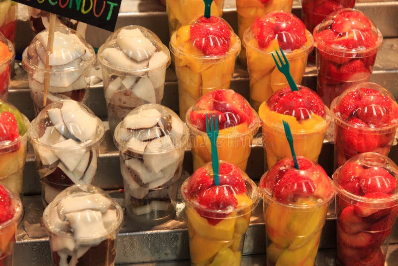 Glasses full of fresh fruit, stand in La Boqueria market, an old traditional market in Barcelona, famous landmark royalty free stock photography Glasses full of fresh fruit, stand in La Boqueria market, an old traditional market in Barcelona, famous landmark royalty free stock photography