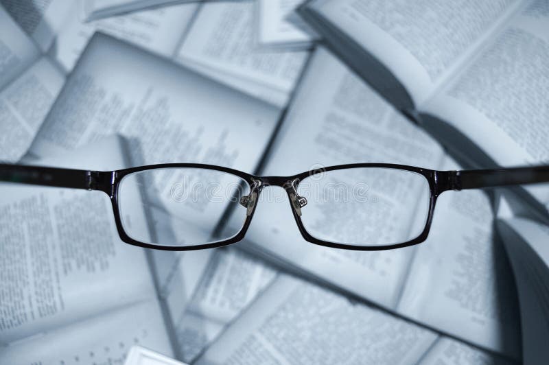 Glasses of group of books