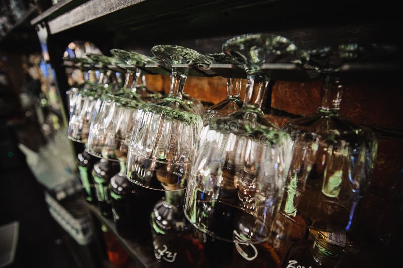 Glasses Hanging Over a Bar Rack Stock Image Image of liquor, inside