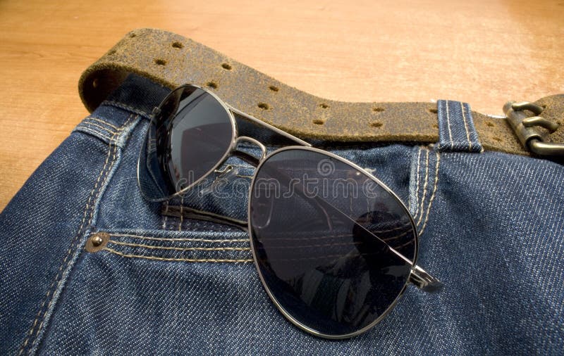 Glasses and jeans stock image. Image of jeans, mobile 13325049
