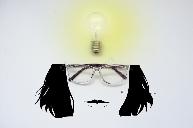 Glasses And A Light Bulb With A Cartoon Face Stock Image Image