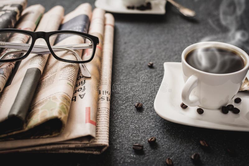 Glasses and newspaper