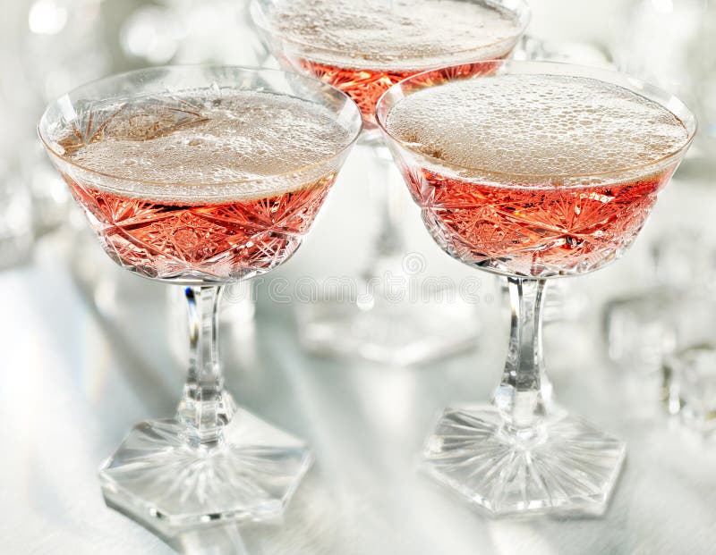 Glasses of pink champagne stock photo. Image of design 47487738