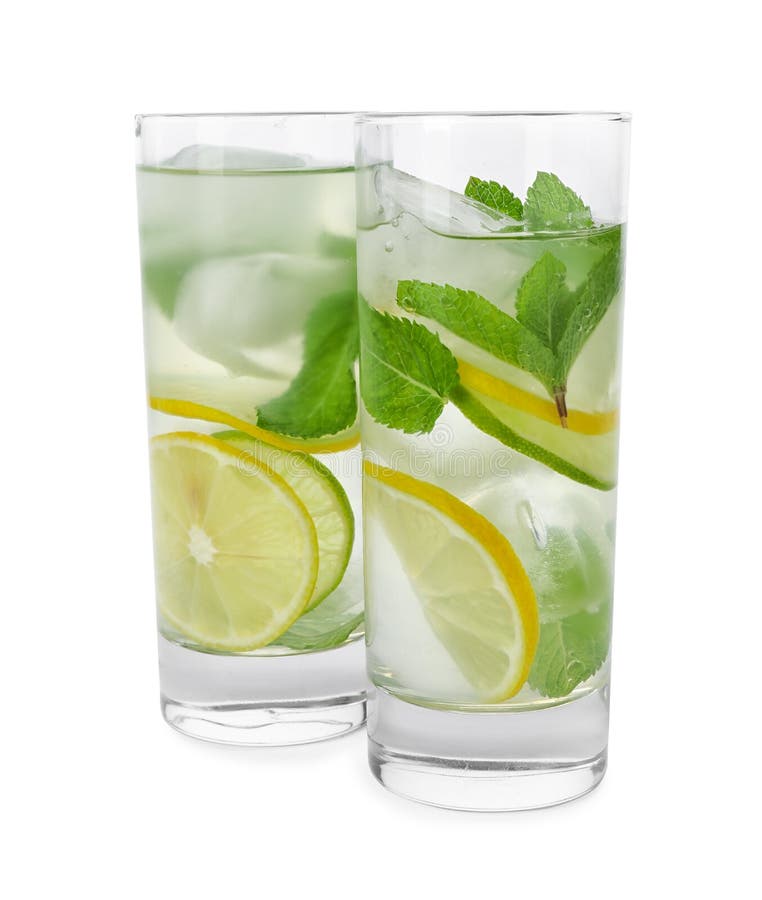 Glasses of Refreshing Drink with Citrus Slices and Mint Stock Photo