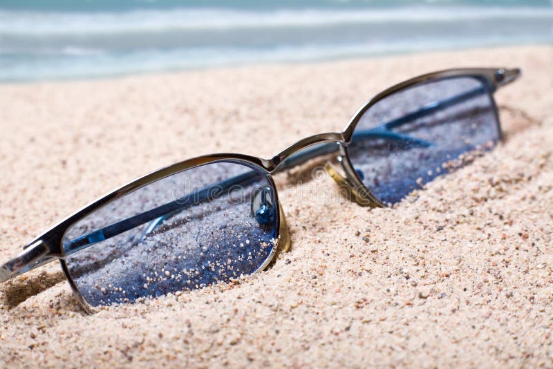 Glasses in sand