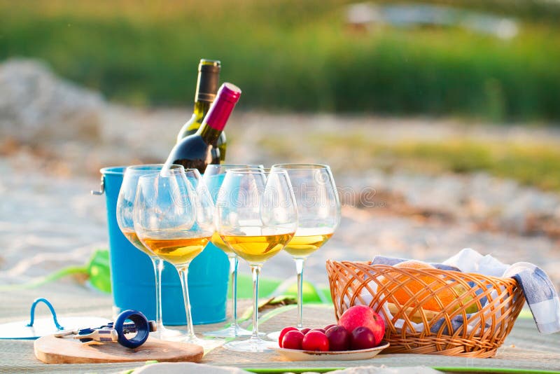 Glasses of the White Wine on the Beach on Sunset, Picnic Theme, Stock ...