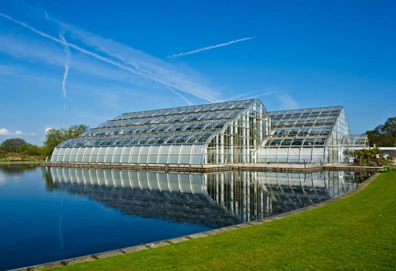 The Glasshouse At Wisley, Surrey, Glowing With Bright Coloured Lights