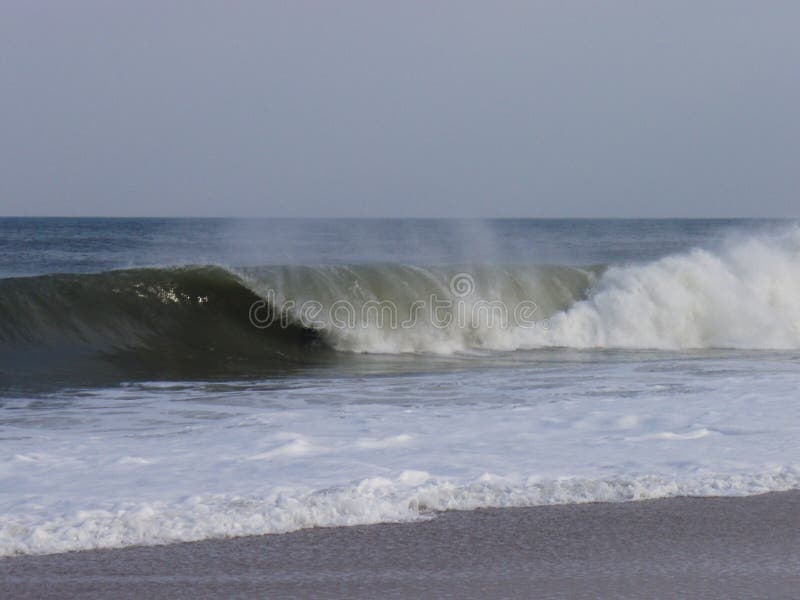 Glassy east coast barrel goes unridden stock photo Glassy east coast barrel goes unridden stock photo