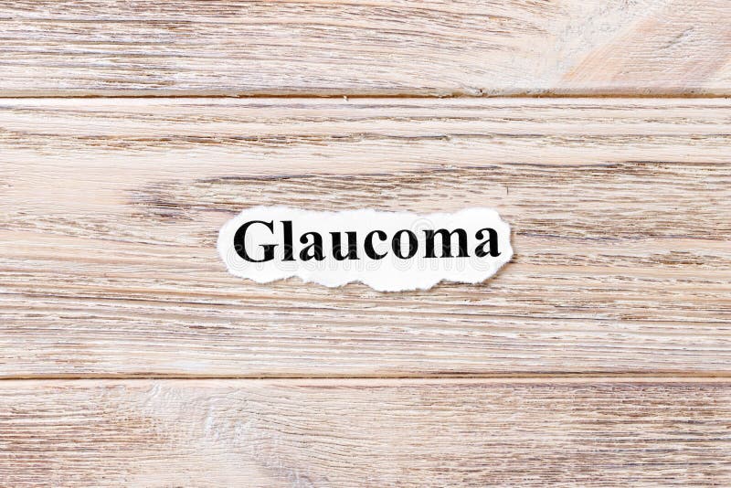 Glaucome du mot sur le papier Concept Mots du glaucome sur un fond en bois photographie stock libre de droits Glaucome du mot sur le papier Concept Mots du glaucome sur un fond en bois photographie stock libre de droits