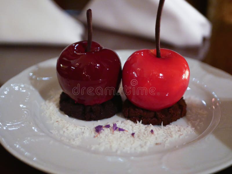 Glazed Apples. Cherry Glaze Candy Lollipop or Red Apples with Caramel