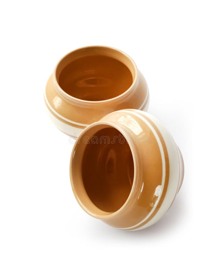 Glazed Ceramic Pots for Cooking on a White Background Stock Photo