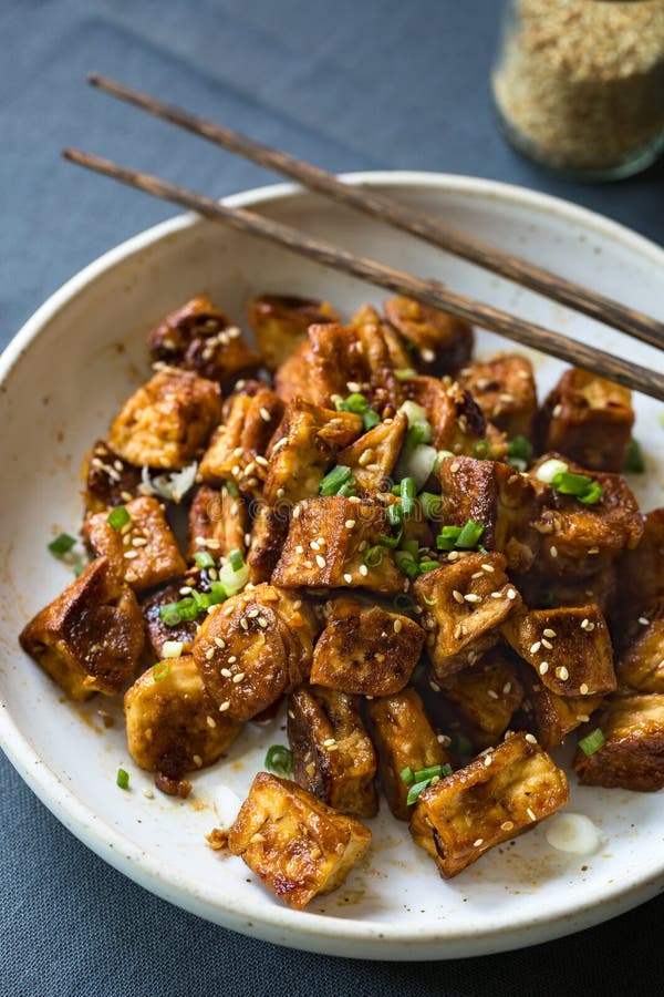 Glazed Tofu with Honey ,Soy Sauce, Ginger and Sesame Stock Image