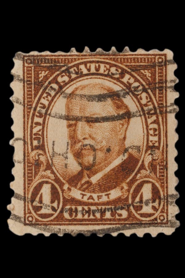 Gli STATI UNITI - CIRCA gli anni 20: Gli Stati Uniti d'annata francobollo da 4 centesimi con il ritratto William Howard Taft Sept immagini stock Gli STATI UNITI - CIRCA gli anni 20: Gli Stati Uniti d'annata francobollo da 4 centesimi con il ritratto William Howard Taft Sept immagini stock