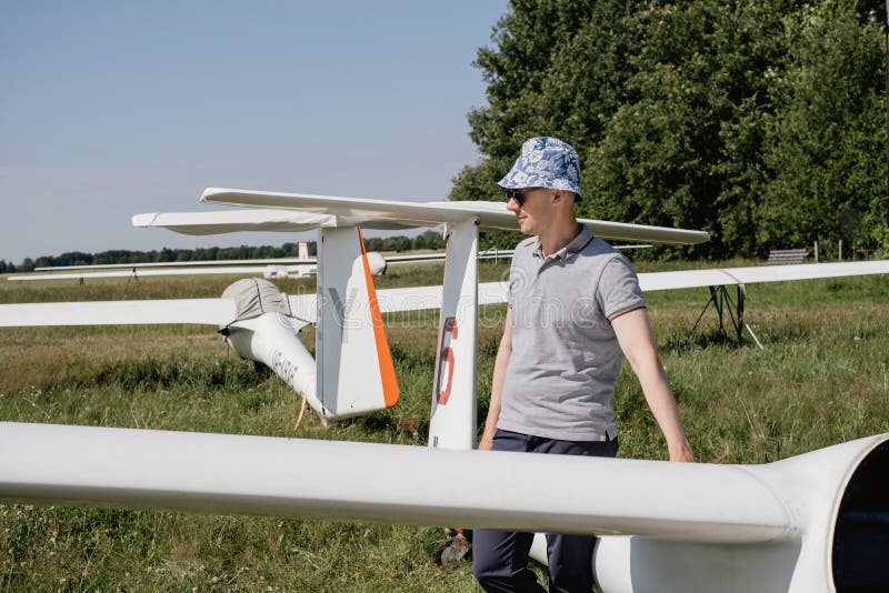 Glider Pilot Getting Ready for Flight on Small Motorless Aircraft Stock