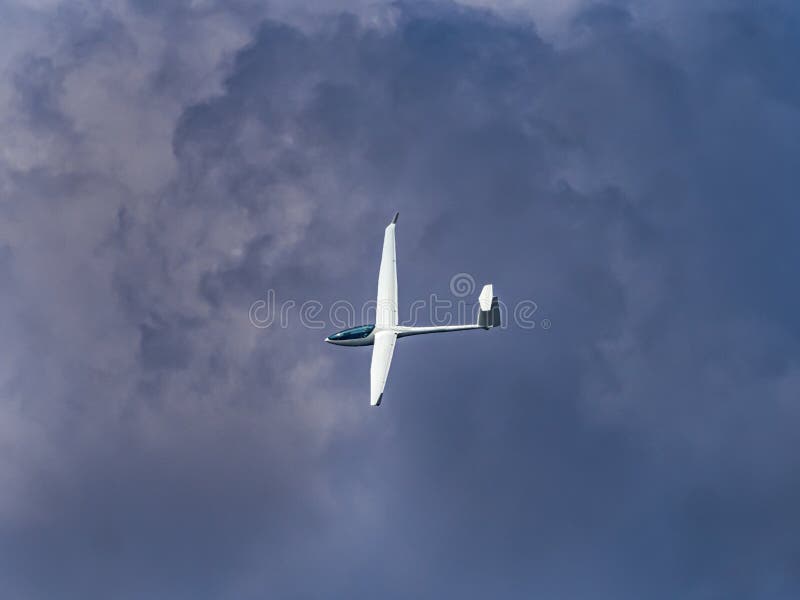 Glider Plane Flying in the Clouds Stock Photo Image of flight, cloud