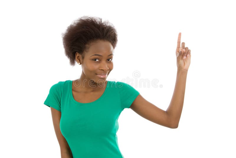 Smiling isolated afro american girl raising up her forefinger. Smiling isolated afro american girl raising up her forefinger.