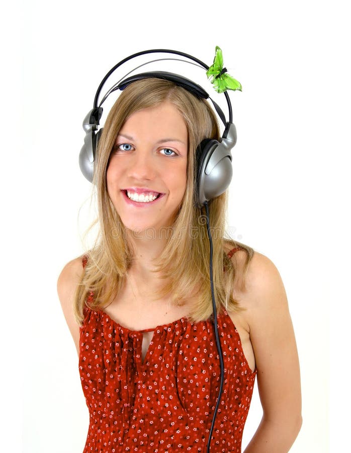 Glimlachend Meisje met Hoofdtelefoons stock afbeelding Glimlachend Meisje met Hoofdtelefoons stock afbeelding