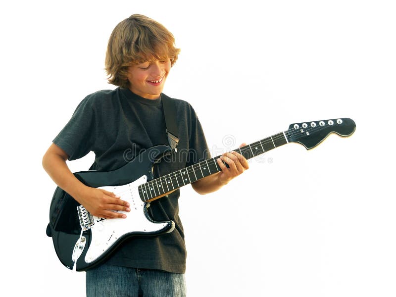 Glimlachende het Spelen van de Jongen van de Tiener Gitaar royalty-vrije stock foto's Glimlachende het Spelen van de Jongen van de Tiener Gitaar royalty-vrije stock foto's