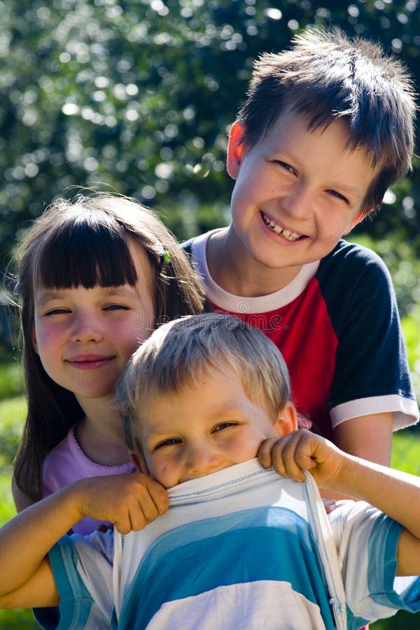 Sister and brothers in garden. Sister and brothers in garden